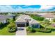 Aerial view showcasing the home's curb appeal and surrounding community at 229 Corelli Dr, Nokomis, FL 34275