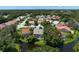 Aerial view highlighting a home's serene waterfront location at 5933 San Michelle Dr, Sarasota, FL 34243