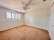 Large bedroom with neutral walls, carpeted floors, and double doors at 5331 87Th W St, Bradenton, FL 34210