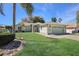 Light green house with a two-car garage at 5018 25Th E St, Bradenton, FL 34203