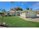 Light green house with a two-car garage at 5018 25Th E St, Bradenton, FL 34203