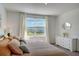 Spacious bedroom with large window and ample natural light at 5725 Haven Ter, Nokomis, FL 34275