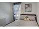 Cozy bedroom with a double bed and neutral decor at 5725 Haven Ter, Nokomis, FL 34275