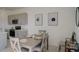 Modern kitchen with grey cabinets, stainless steel appliances, and a large island at 5725 Haven Ter, Nokomis, FL 34275