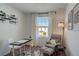 Home office with a comfortable chair and desk, plus a window at 5725 Haven Ter, Nokomis, FL 34275
