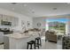 Open concept kitchen and living area with water view at 5725 Haven Ter, Nokomis, FL 34275