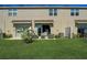 Private backyard with patio and lush green grass at 5725 Haven Ter, Nokomis, FL 34275