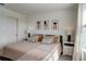 Bright bedroom with a king-size bed and neutral decor at 5725 Haven Ter, Nokomis, FL 34275