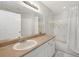 Clean bathroom with a single sink vanity and bathtub at 5531 Rosehill Rd # 203, Sarasota, FL 34233