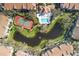 Community features a pool, tennis court, and pond at 850 S Tamiami Trl # 833, Sarasota, FL 34236