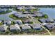 Aerial view of Worthington community, featuring a lake and upscale homes at 4653 Antrim Dr, Sarasota, FL 34240