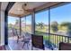 Outdoor patio with seating and a view of the golf course at 14619 Leopard Creek Pl, Lakewood Ranch, FL 34202