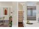 View of the kitchen with the walk-in pantry, stainless steel refrigerator and decor at 1884 Grove St, Sarasota, FL 34239