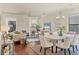 Bright and inviting living room features hardwood floors, modern decor, and ample natural light at 1884 Grove St, Sarasota, FL 34239