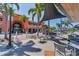 Outdoor seating area with tables and chairs, located near shops and restaurants at 1884 Grove St, Sarasota, FL 34239
