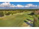 Aerial view of a beautiful golf course at 14619 Leopard Creek Pl, Lakewood Ranch, FL 34202