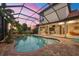 Inviting pool and patio with covered lanai and spa at 14619 Leopard Creek Pl, Lakewood Ranch, FL 34202