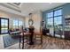 Relaxing community room with comfortable seating and a work area at 14619 Leopard Creek Pl, Lakewood Ranch, FL 34202