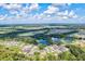 Aerial view of community with lakes and conservation at 14607 Swiss Bridge Dr, Lithia, FL 33547