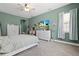 Spacious bedroom with large bed, dresser, and TV at 14607 Swiss Bridge Dr, Lithia, FL 33547