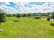 Dog park with grassy area, seating, and agility features at 14607 Swiss Bridge Dr, Lithia, FL 33547