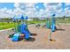 Modern playground with slides and climbing structures at 14607 Swiss Bridge Dr, Lithia, FL 33547