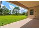 Spacious backyard with lush green grass at 14607 Swiss Bridge Dr, Lithia, FL 33547