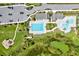 Community pool and recreation area, including a lap pool and playground at 14607 Swiss Bridge Dr, Lithia, FL 33547
