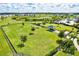 Dog park with fenced area, agility equipment, and shaded seating at 14607 Swiss Bridge Dr, Lithia, FL 33547