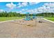 playground with swings, slides, and play structures at 14607 Swiss Bridge Dr, Lithia, FL 33547