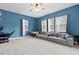 Spacious bonus room with large windows, foosball table and seating at 14607 Swiss Bridge Dr, Lithia, FL 33547