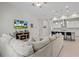 Open concept living and kitchen area with modern appliances and fireplace at 14607 Swiss Bridge Dr, Lithia, FL 33547