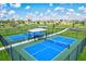 Two pickleball courts with covered seating areas at 14607 Swiss Bridge Dr, Lithia, FL 33547