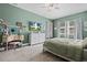 Bright bedroom with a vanity, dresser, and comfortable bed at 14607 Swiss Bridge Dr, Lithia, FL 33547