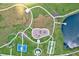 Aerial view of community amenities including playground, lake, and walking paths at 14607 Swiss Bridge Dr, Lithia, FL 33547