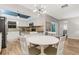 Modern kitchen with stainless steel appliances and breakfast bar at 251 Plantation Rd, Venice, FL 34293