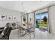 Bright dining room with sliding glass doors leading to backyard at 7434 35Th E Ln, Sarasota, FL 34243