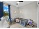 Charming bedroom with a crib and playful decor at 7434 35Th E Ln, Sarasota, FL 34243
