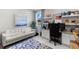 Home office features a built-in desk and comfortable seating at 7434 35Th E Ln, Sarasota, FL 34243