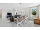Spacious dining area with large windows and view to backyard at 7434 35Th E Ln, Sarasota, FL 34243