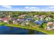 Aerial view of luxury homes and a golf course at 5207 Pine Shadow Ln, North Port, FL 34287