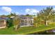 Home with private screened pool and canal view at 5207 Pine Shadow Ln, North Port, FL 34287