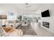 Spacious living room with fireplace and pool view at 5207 Pine Shadow Ln, North Port, FL 34287