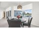 Breakfast nook with water view and a round table at 5207 Pine Shadow Ln, North Port, FL 34287