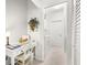 Laundry room with washer, dryer, and desk area at 5207 Pine Shadow Ln, North Port, FL 34287