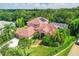 Aerial view of single Gathering home with pool and lush landscaping at 9915 Old Hyde Park Pl, Bradenton, FL 34202