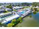 Community features pool, shuffleboard, and pond at 718 50Th Avenue W Dr, Bradenton, FL 34207