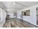 Sunroom with a pass-through to the kitchen at 718 50Th Avenue W Dr, Bradenton, FL 34207