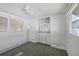 Bedroom with built-in dresser and mirrored closet doors at 718 50Th Avenue W Dr, Bradenton, FL 34207