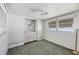 Bright bedroom with mirrored closet doors and ceiling fan at 718 50Th Avenue W Dr, Bradenton, FL 34207